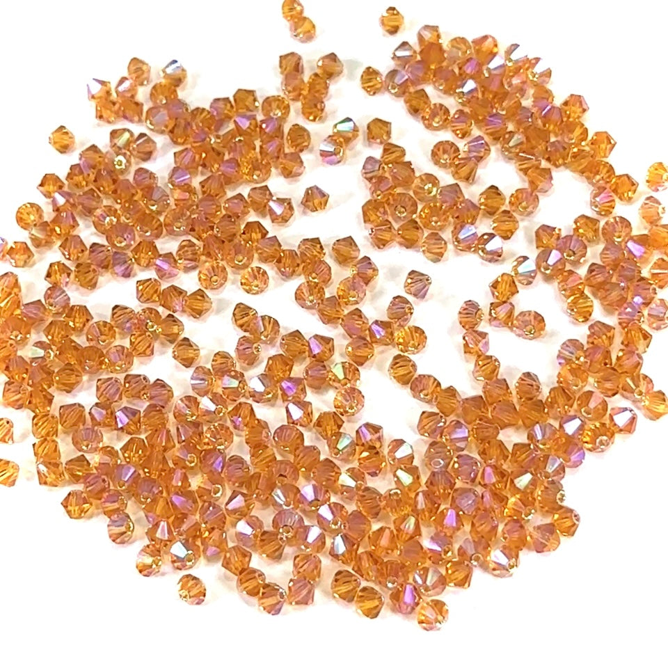 Topaz full AB (AB2X) Czech Glass Beads Machine Cut Bicones (MC Rondell Diamond Shape) golden brown crystals double-coated with Aurora Borealis 3mm 4mm 6mm